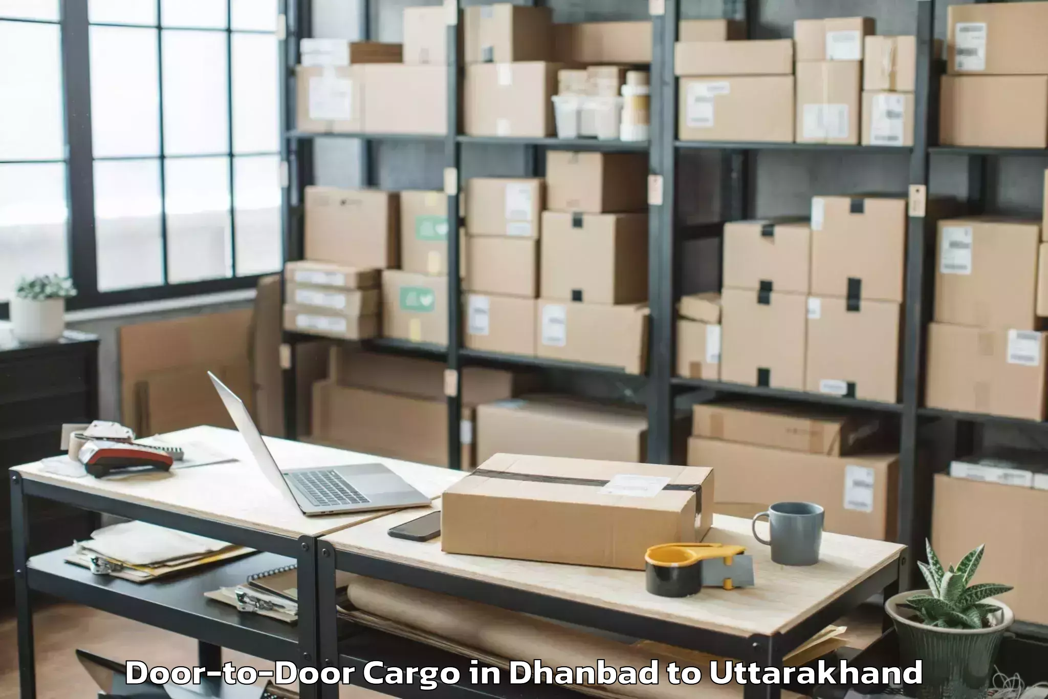 Book Dhanbad to Tharali Door To Door Cargo Online